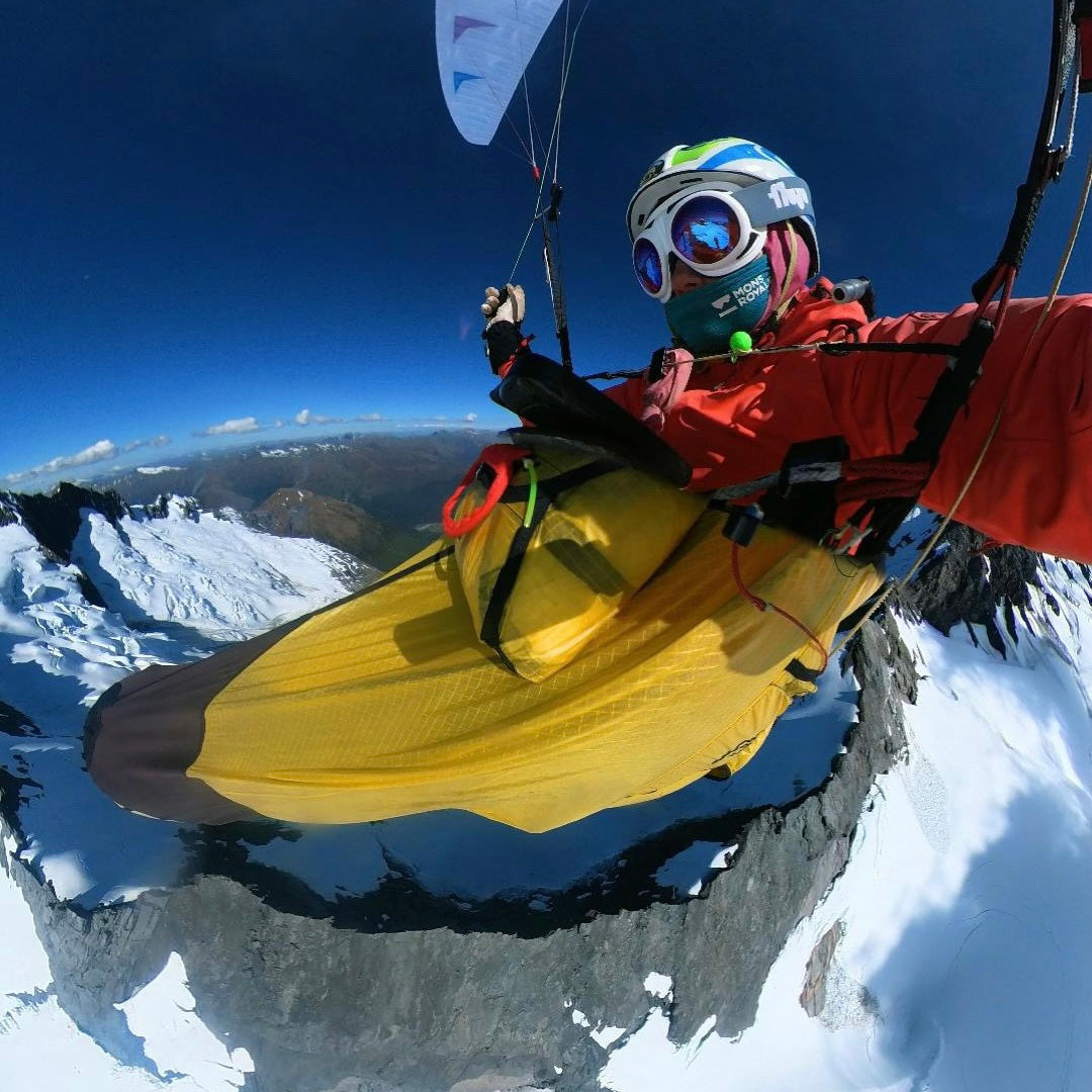 Paraglider pilot Kinga Masztalerz flying high above Mont Blanc